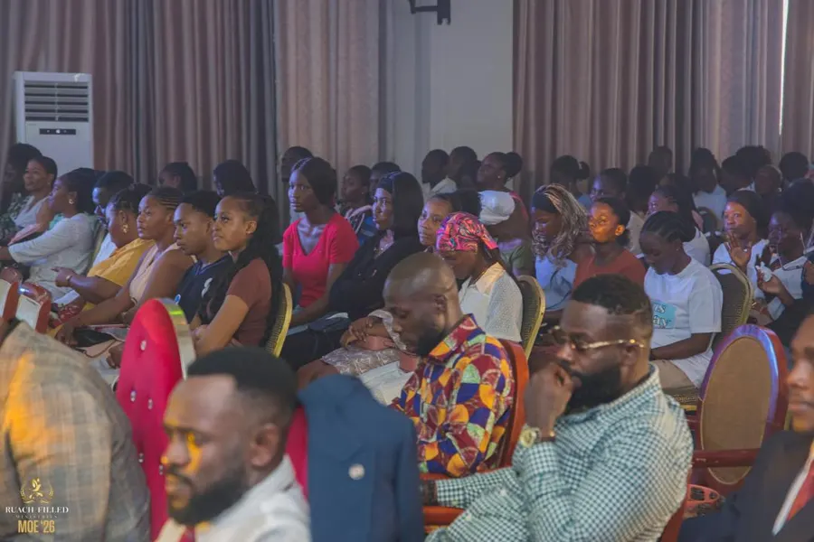 Attendees seated attentively during a session